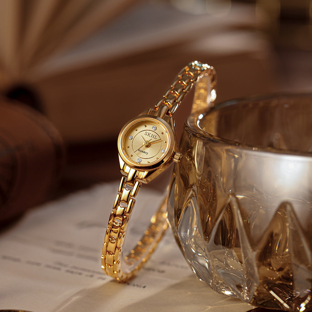 Mid-ancient Simple And Light Luxury Quartz Mini Round Elegant Steel Belt Casual Women's Watch